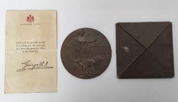 A WW1 Death Plaque, Condolence Slip, and original card case for the plaque, awarded to 7842 Pte