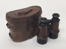 A pair of French WWI Binoculars in a mismatched British WW1 leather case. To include: Binoculars