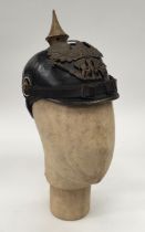 A WW1 Imperial German Prussian soldiers Pickelhaube leather helmet. Of traditional form, with a