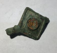 2nd to 3rd century copper alloy Roman lozenge plate brooch. Pin missing. Centre circle still