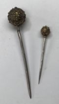 Two Rare Tudor Silver-Gilt Dress Pin’s.  Circa 16th century, the large Pin 102mm x 20mm, the