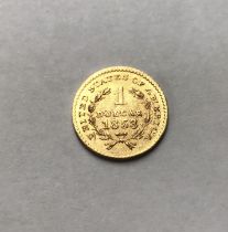 USA 1853 gold One Dollar.