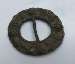 c.1690 – c.1730. Post-medieval copper alloy buckle frame, double-looped with addorsed D-shaped loops