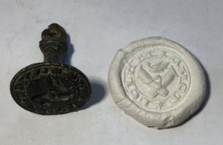 Medieval “chess piece” circular style bronze seal matrix, hexagonally facetted handle with pointed