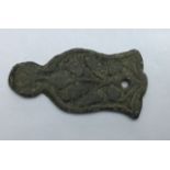 Mid 16th - mid 17th century.Post-medieval copper alloy mount with one rivet hole and a symmetrical