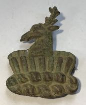 Large late post-medieval copper alloy harness mount in the form of a stag's head in relief within