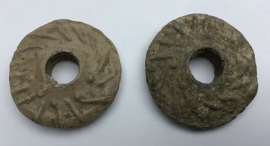 Double lot of 15th to 16th century medieval lead spindle whorls. Biconvex, decorated in relief