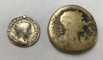 Gordian III Silver Antoninianus with a worn Trajan Sestertius