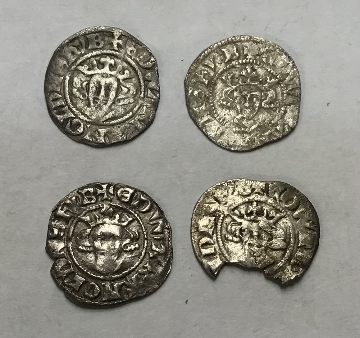 Four Edward II Silver Pennies, two Canterbury Mint, one London and one Bury St. Edmunds (missing