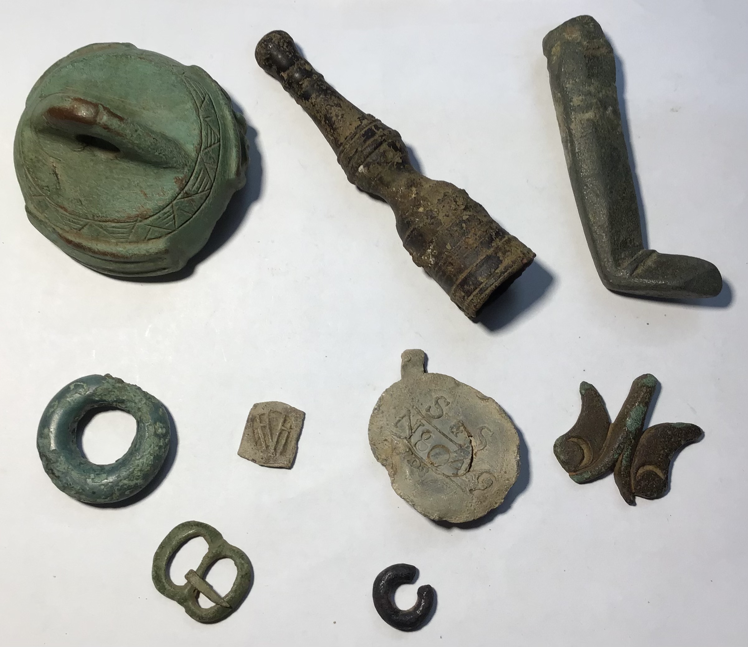 A mixed 9 item lot including a 14th to 15th century medieval copper alloy leg from a tripod ewer