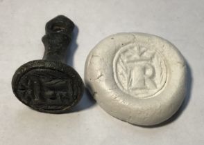 Medieval “chess piece” circular style bronze seal matrix, hexagonally facetted handle with pointed