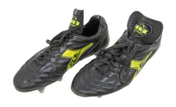 Football: A pair of Diadora Match Winner II football boots, black and yellow, worn by Roy Keane