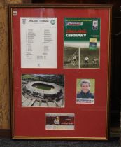 England: A framed and glazed montage of England v Germany 7th October 2000, to include: team