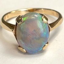 Single oval opal ring set in a10k marked setting. Size N. Approximately 3.3 grams