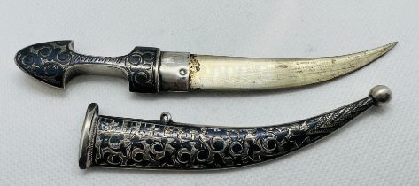 An early 20th century Russian Niello work curved dagger and sheath. Marked for Russian 840