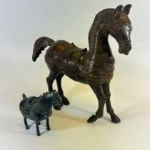 Two Oneutral Carved black stone horses and a deer, approx 12cm long.