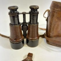 A pair of Ross of London 1904 binoculars and a pocket watch and a Metropolitan police whistle