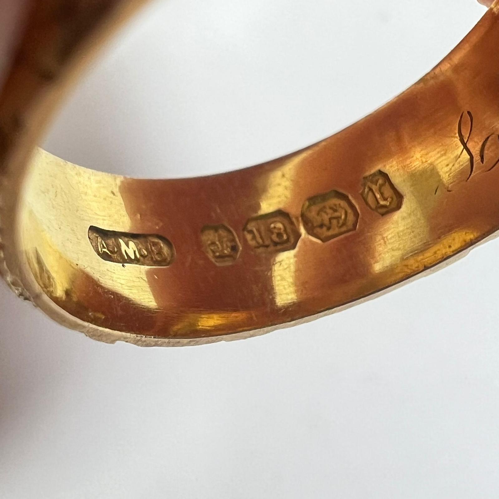 A Hallmarked 18ct yellow gold foliate engraved band ring, size T approx 9grams band width approx - Image 4 of 4