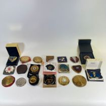 A collection of 20 powder compacts including Yves Saint Laurent jewel.