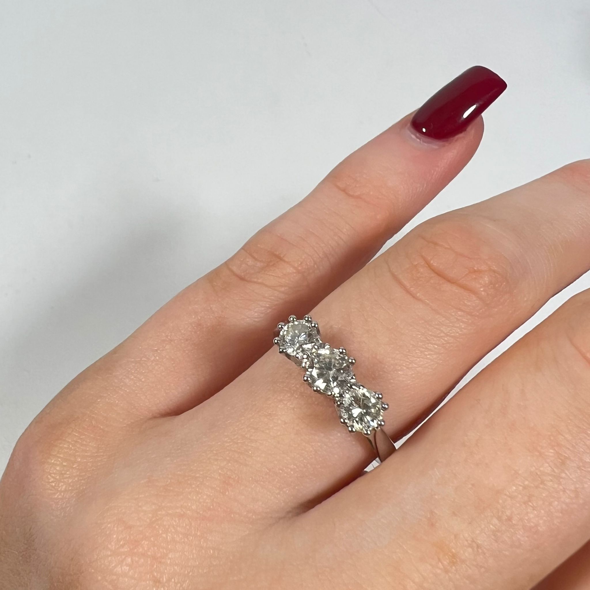 ****REOFFER JANUARY 12 2024, ESTIMATE £600-800***** An 18ct white gold 3 stone diamond ring, size M. - Image 2 of 3