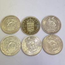 A selection of English Shillings in UNC (Uncirculated) Condition