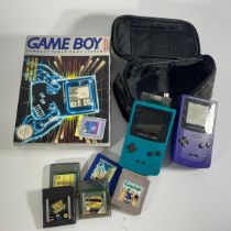 Boxed Gameboy compact video game system with Tetris along with 2 Gameboy colours various games