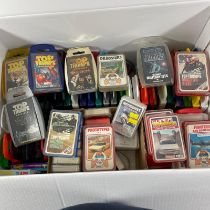 A collection of approximately 90 sets of Top Trumps playing cards, vintage and modern, including