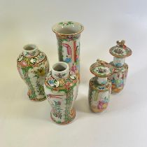 2 pairs of famille Rose vases, one pair with lids and a single vase approx 20cm tall. Please see