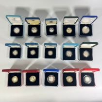 Collection of cased silver proof British coins