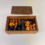 A boxwood and Ebony weighted chess set. Height of King approx 9cm. Condition - white king is