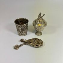 A white metal lidded incense burner - approx 13cm tall. An embossed 800 silver Eartery beaker and