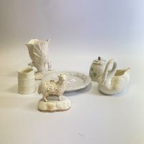 A collection of Belleek to include: A 2nd period Belleek Cabbage Vase, approximately 150mm A 1st