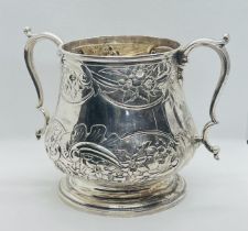 An Edward VII sterling silver footed, two handled cup. Approximate weight 370 grams. Marked for John