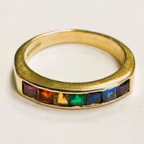 Rainbow set gems 18ct gold ring. Either sapphires or emeralds square cut. Ring size Q. Approximately
