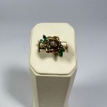 A 14ct yellow gold flowering rose diamond and emerald ring. Size L. Approximately 8.6 grams