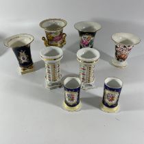 A collection of 8 19th Century and later spill vases, including a Miessan vase and a Derby type