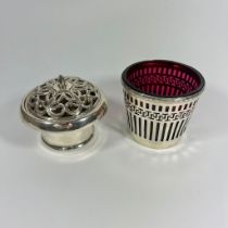 A silver pot pourri lidded bowl. Approx 11cm tall diameter.Approx 8cm tall and a continental 800