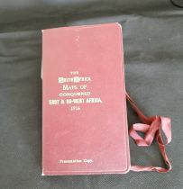 A 1916 map, leather bound presentation copy entitled "The South Africa Maps of Conquered East and SO