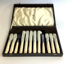 A cased Mappin and Webb plated fish knife and fork set