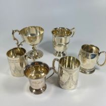 4 silver tankards and 2 silver footed cups, tallest approx 12cm. Total weight approx 586grams.