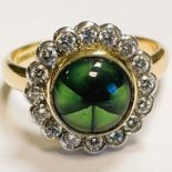 Trapiche emerald and diamond 18ct yellow gold ring. Cabochon emerald approximately 3.95ct set in