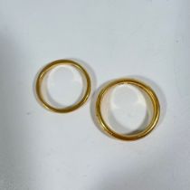 2 x 22ct yellow gold rings - 1 size L 1/2 circa 3grams. 1 x size P - circa 6grams.