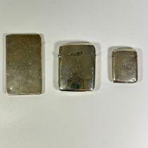 2 silver vestas and a silver card case approximate 10cm tall, total approx 177grams. All close