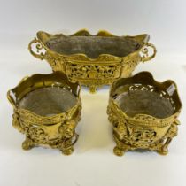 An Ormulu/brass Centre Jardiniere - approx 42cm wide, approx 17cm tall and a pair of near matching