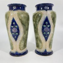 A pair of matching Royal Doulton vases with cobalt blue ground. Both in good condition.