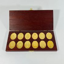 The Arms of the Prince & Princess of Wales - set of 12 gilt silver ingots. Limited edition of