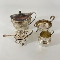 A Georgian Silver mustard with blue glass liner, another silver mustard, miniature silver jug and