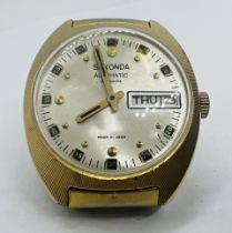 A 1970s Sekonda 26 jewels Automatic gentleman's wristwatch in a gilded textured case. Case
