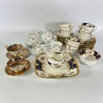 Part coalport cobalt blue batwing tea-set comprising of 11 cups, 12 saucers, 12 tea plates, milk