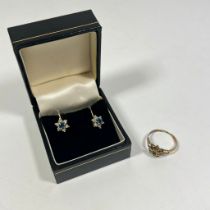 A pair of 9ct yellow gold diamond and sapphire screw back earrings and a gilt metal mug size O (